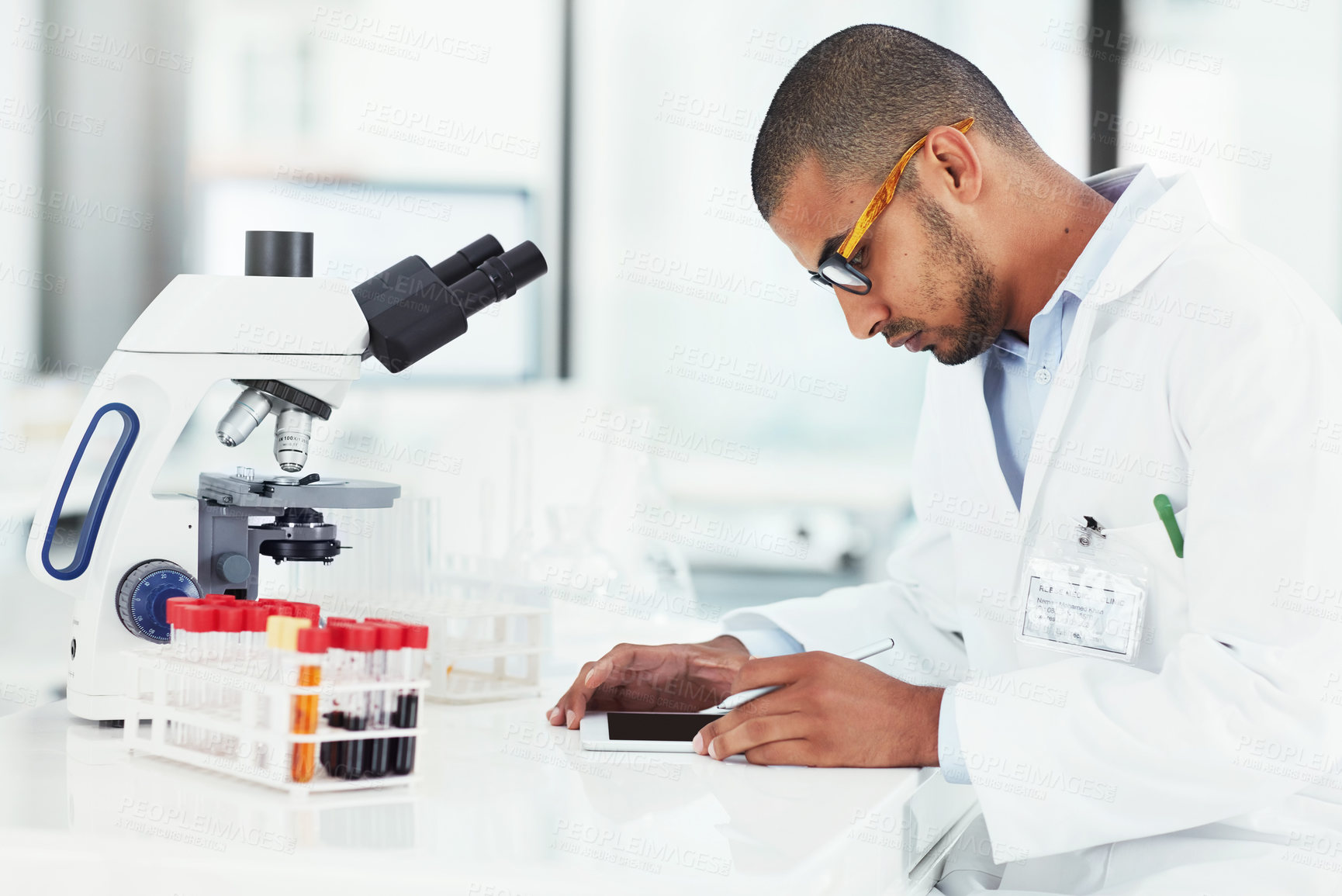 Buy stock photo Man, scientist and tablet with reading at lab, blood sample or pharma research for vaccine development. Person, thinking and touchscreen with app for review, study or innovation with drugs for health