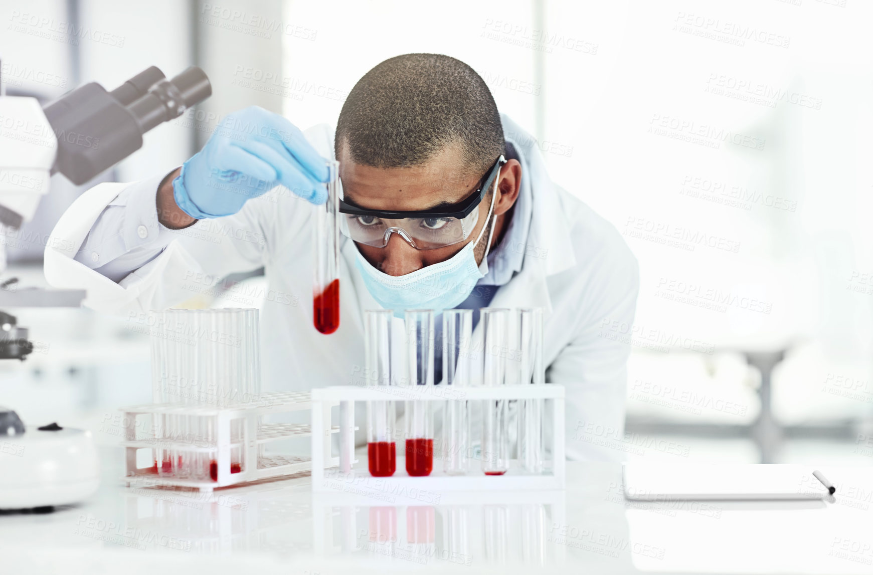 Buy stock photo Man, scientist and blood sample at laboratory with vial, face mask and study for mpox vaccine trial. Person, liquid and container with thinking, ppe and safety with chemical for medical research