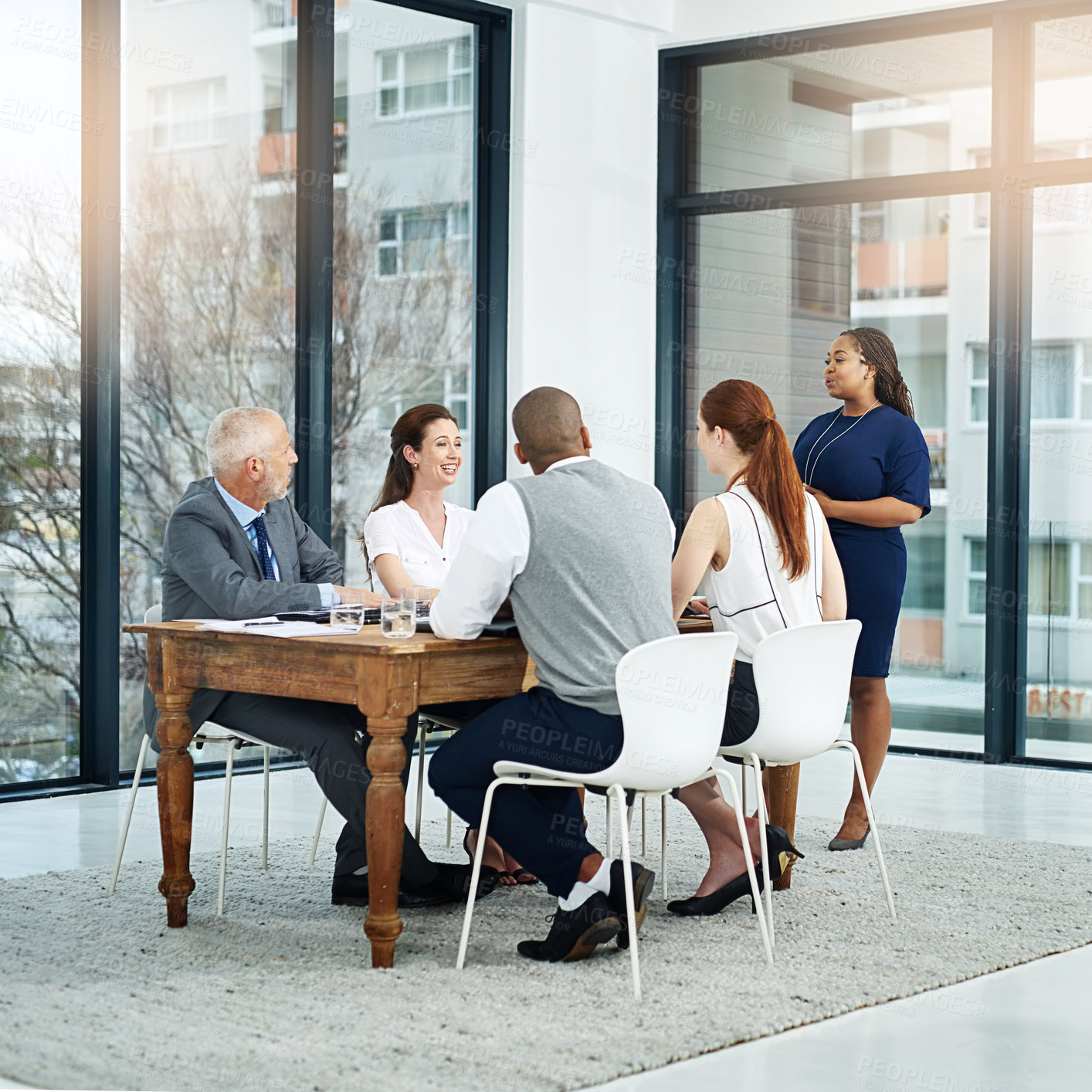 Buy stock photo Full length shot of a young businesswoman giving a presentation in the boardroom