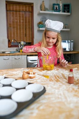 Buy stock photo Happy, child or young chef baking in kitchen for learning, practice and making dessert. Fun, chaos and little girl mixing eggs or ingredients in bowl with energy and excitement for home made snack