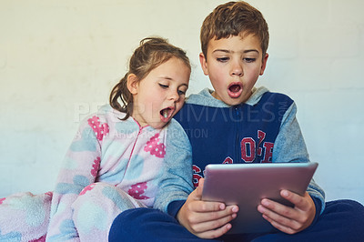 Buy stock photo Surprise, games and kids in shock with tablet for gaming or watch a video online with technology. Wow, crazy and children in home with announcement, info or reading ebook on app or playing on tech