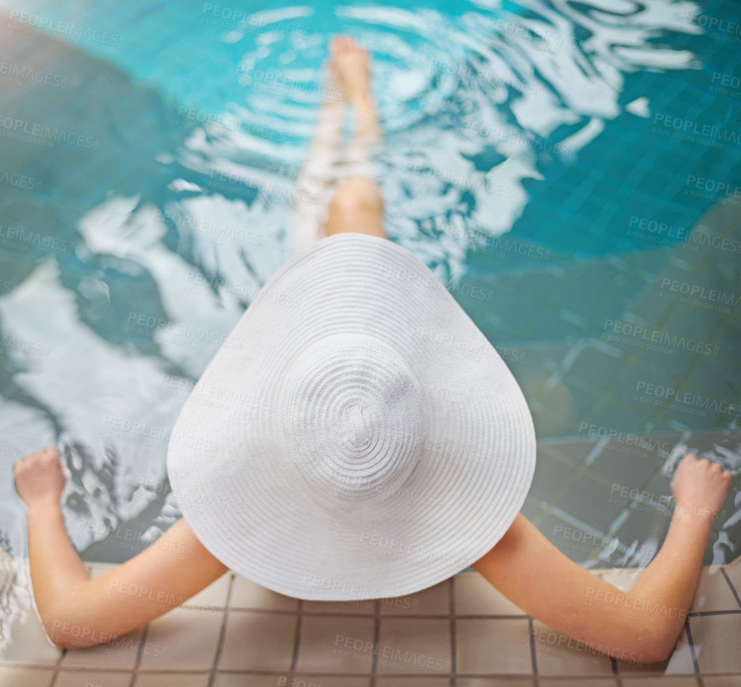 Buy stock photo High angle shot of woman relaxing in the pool at a spa