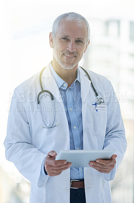 Buy stock photo Healthcare, portrait and tablet with doctor man in hospital for information, research or treatment. Smile, technology and trust with happy mature medicine professional in clinic for medical care