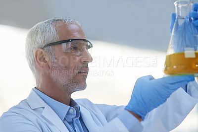 Buy stock photo Technician, laboratory and beaker in hospital for medical research, examination or consultation with sample. Scientist, male person and mature in testing, clinic or results for healthcare or medicine