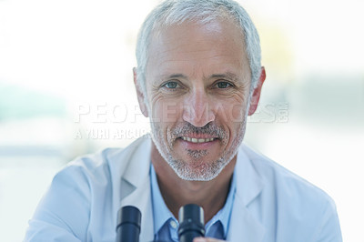 Buy stock photo Science, microscope and portrait mature man in lab for biotech engineering, innovation and research. Laboratory, test and scientist checking sample for pharmaceutical development in medical study.