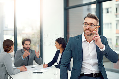 Buy stock photo Thinking, businessman and phone call for negotiation, discussion or deal with communication in office. Male person, ceo and leader with workers, proposal or mobile at business meeting in workplace