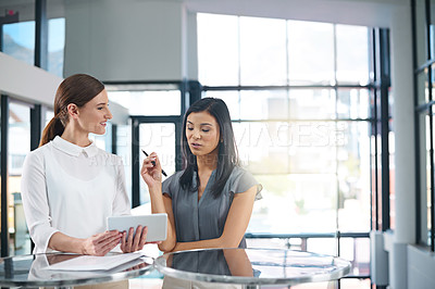 Buy stock photo Tablet, teamwork or business women in meeting for project, conversation or discussion for research report. Collaboration, talking or colleagues in office planning with tech or financial news online 