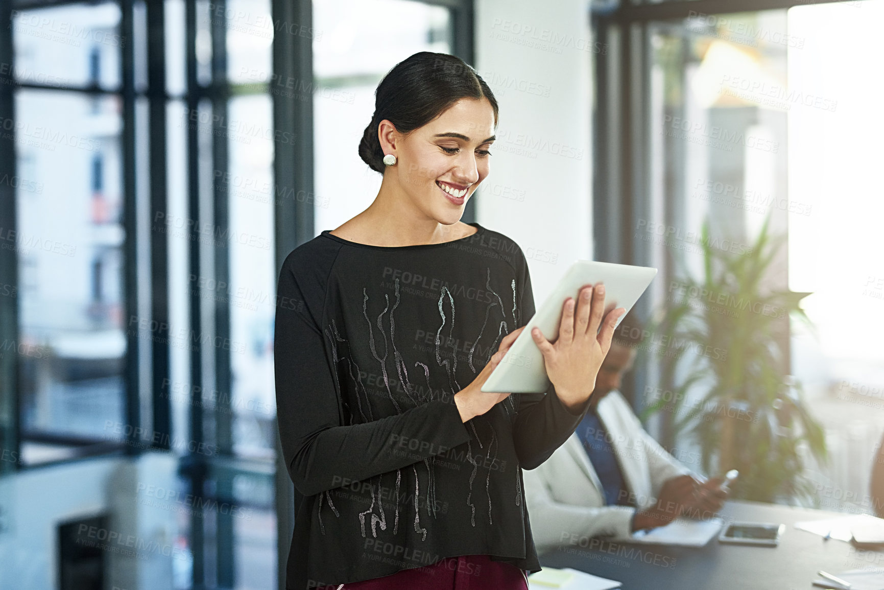 Buy stock photo Happy woman, creative and business with tablet for research, browsing or networking at office. Female person or employee with smile for technology, online app or productivity for startup at workplace