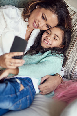 Buy stock photo Happy, mother and girl with smartphone selfie for social media, family picture or bonging together. Smile, parent and daughter with mobile for fun on vacation, school holiday and memories with love