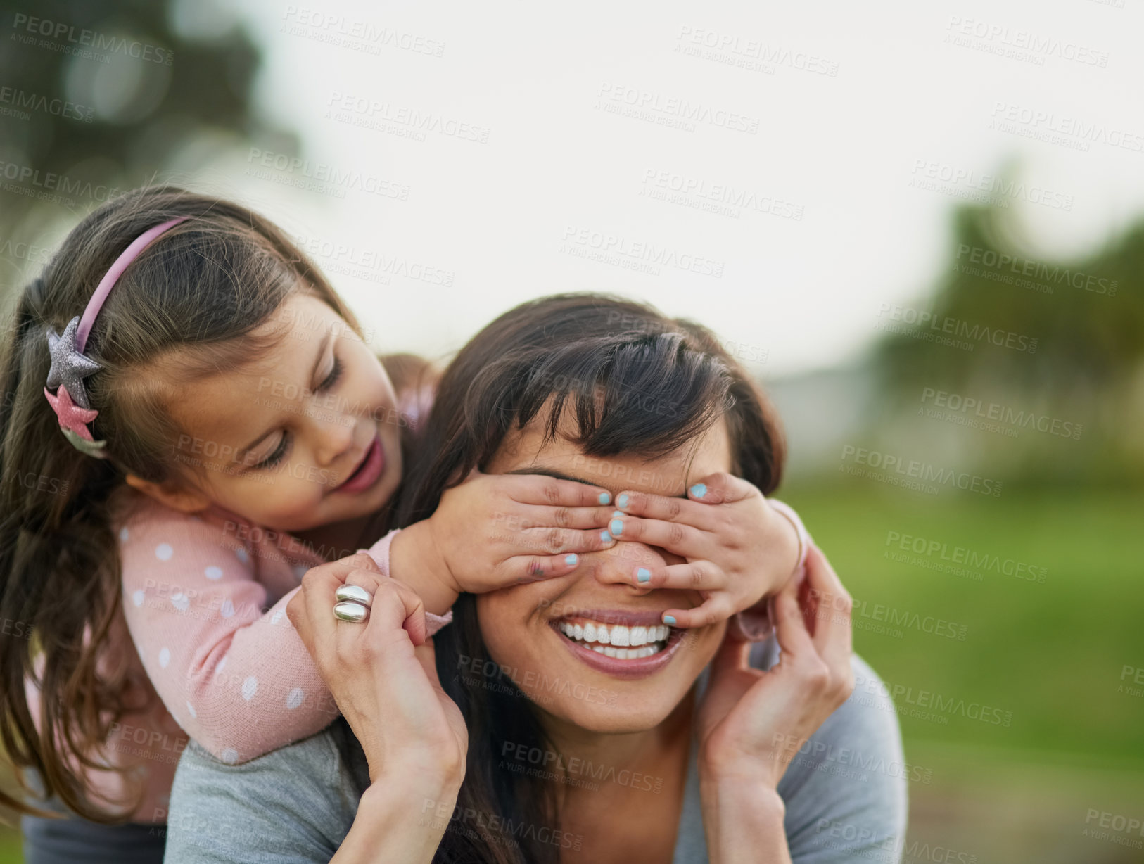 Buy stock photo Cropped shot of a mother and daughter enjoying some quality time together outdoors