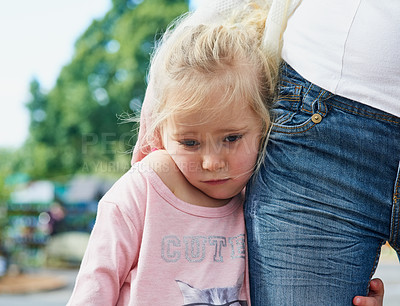 Buy stock photo Portait of a sad little girl being comforted by her mother outside