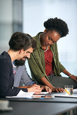 Buy stock photo Cropped shot of a group of young creatives working together in an office