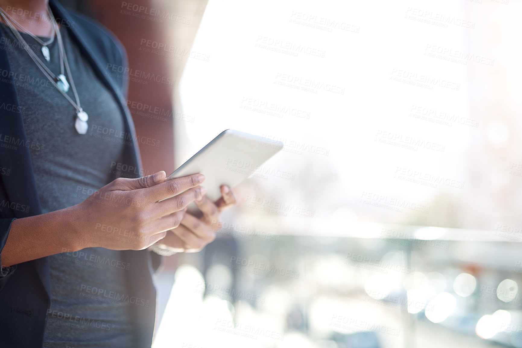 Buy stock photo Hands, business and woman with tablet, connection and typing with internet, research and journalist. Sunshine, person or employee with technology, online reading and news with digital app and closeup