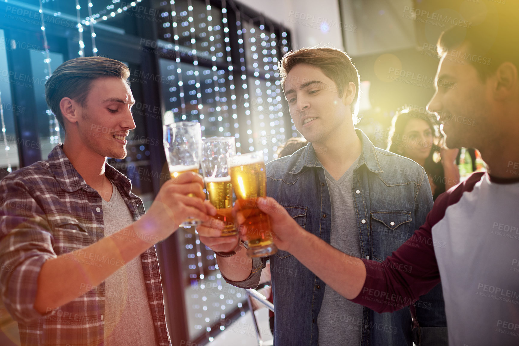 Buy stock photo Men, beers and cheers with friends drinking at social event,  restaurant or party with happiness. People, alcohol and glasses to toast at  pub for happy hour, conversation or  celebration together