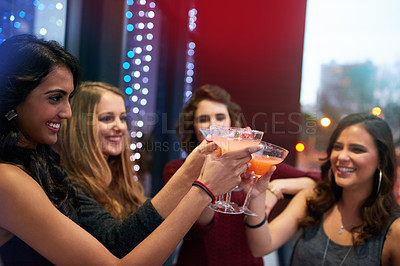 Buy stock photo Pub, friends and group cheers with drink at party together for celebration, event or happy hour at night club. Toast, girls or women with alcohol glass at cocktail bar for social gathering with bokeh