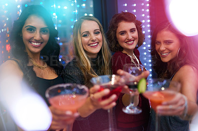 Buy stock photo Women, friends and cocktail with toast for portrait at nightclub, event or happy hour together. People, club and drink with group, alcohol and smile with celebration for new year with chat in night