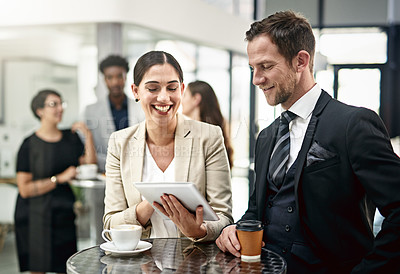 Buy stock photo Happy, business people and tablet with coffee for collaboration, proposal or discussion at office. Businessman and woman smile on technology for creative ideas, conversation or startup at workplace