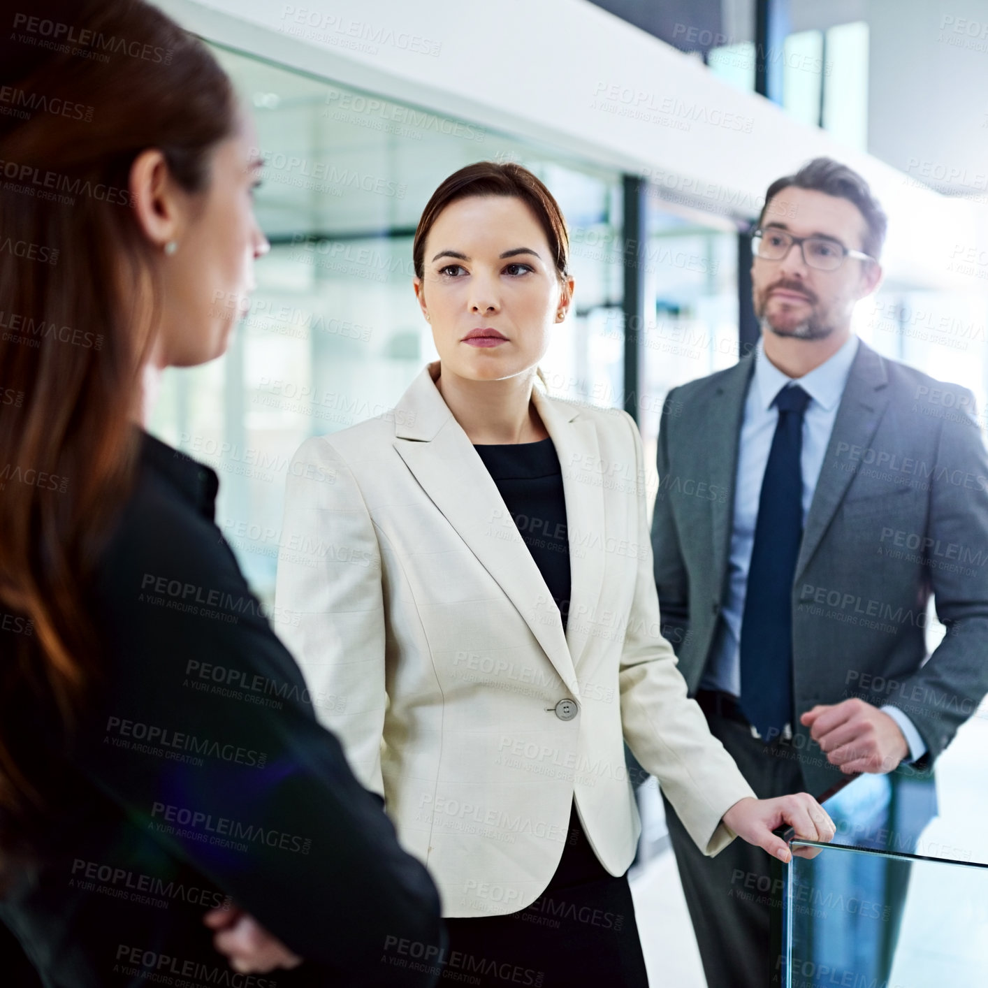 Buy stock photo Business people, serious and discussion with manager for problem, solution or issue in conflict resolution at office. Employee group in conversation or corporate dispute with executive at workplace