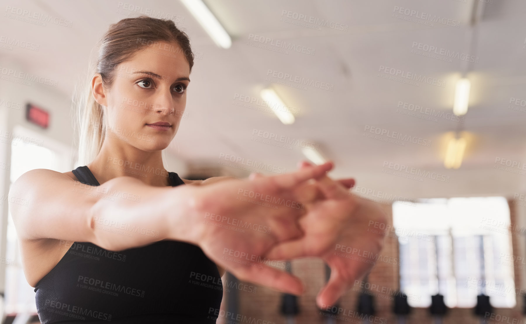 Buy stock photo Fitness, woman and stretching arms in gym ready for workout, exercise and training as daily routine. Female athlete, warm up and prepare for physical activity, sports and cardio with determination