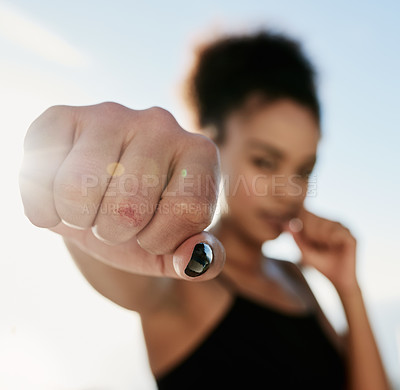 Buy stock photo Black woman, boxer and hand to punch for fitness in outdoor for workout or training with health or wellness as fighter. Active, female person and exercise with fist for speed as warrior by house
