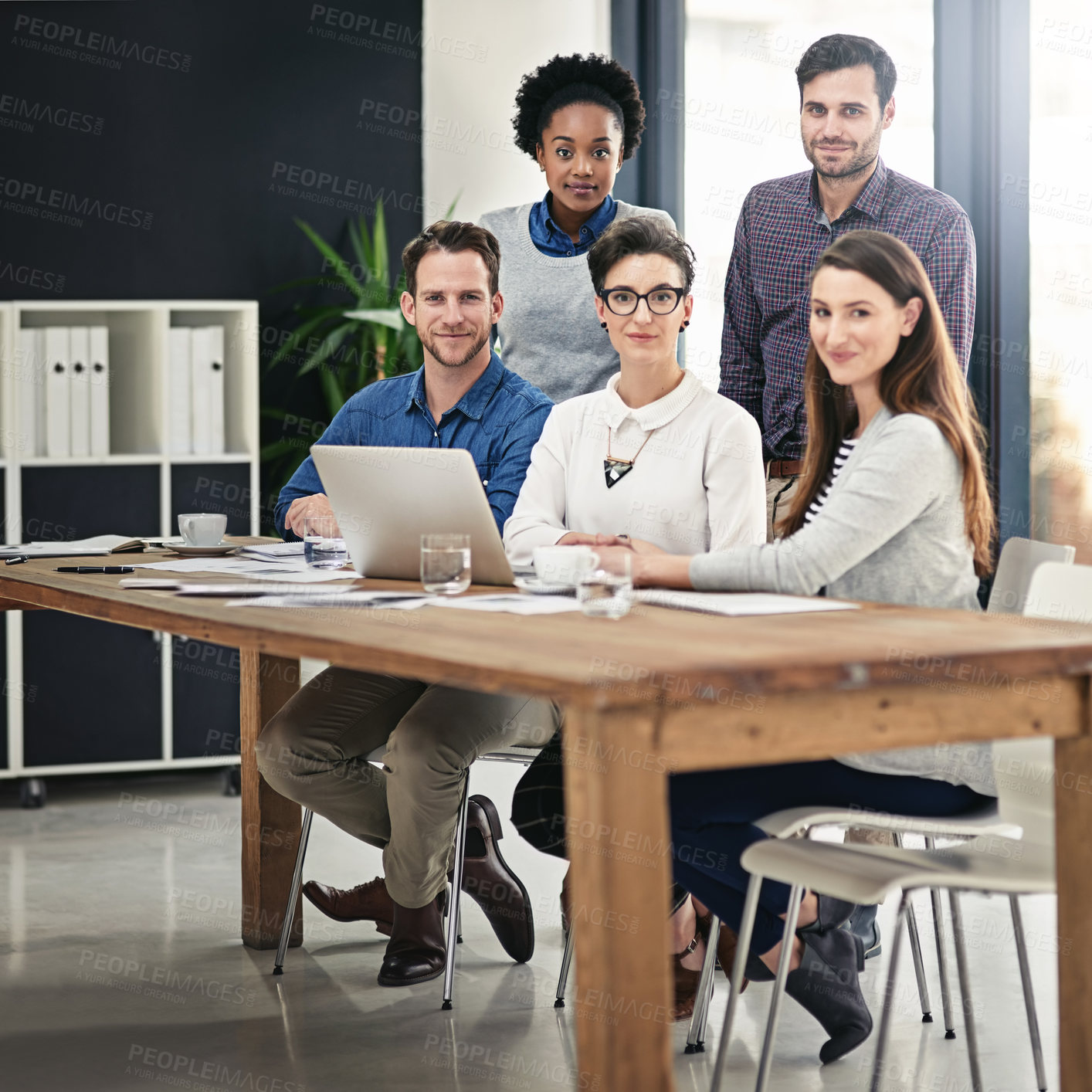 Buy stock photo Laptop, meeting and project management with portrait of business people in office for creative discussion. Collaboration, computer and startup company with designer group in workplace together