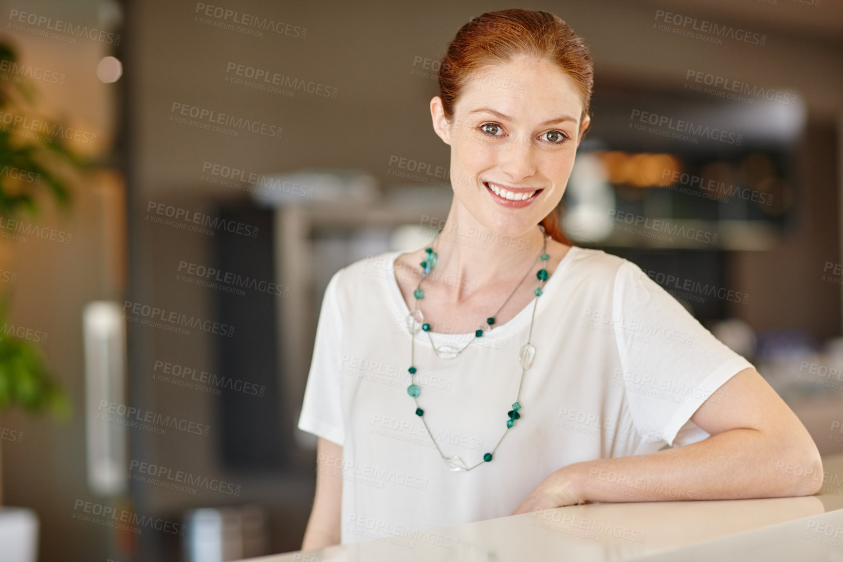 Buy stock photo Portrait of a confident young businesswoman standing in an office