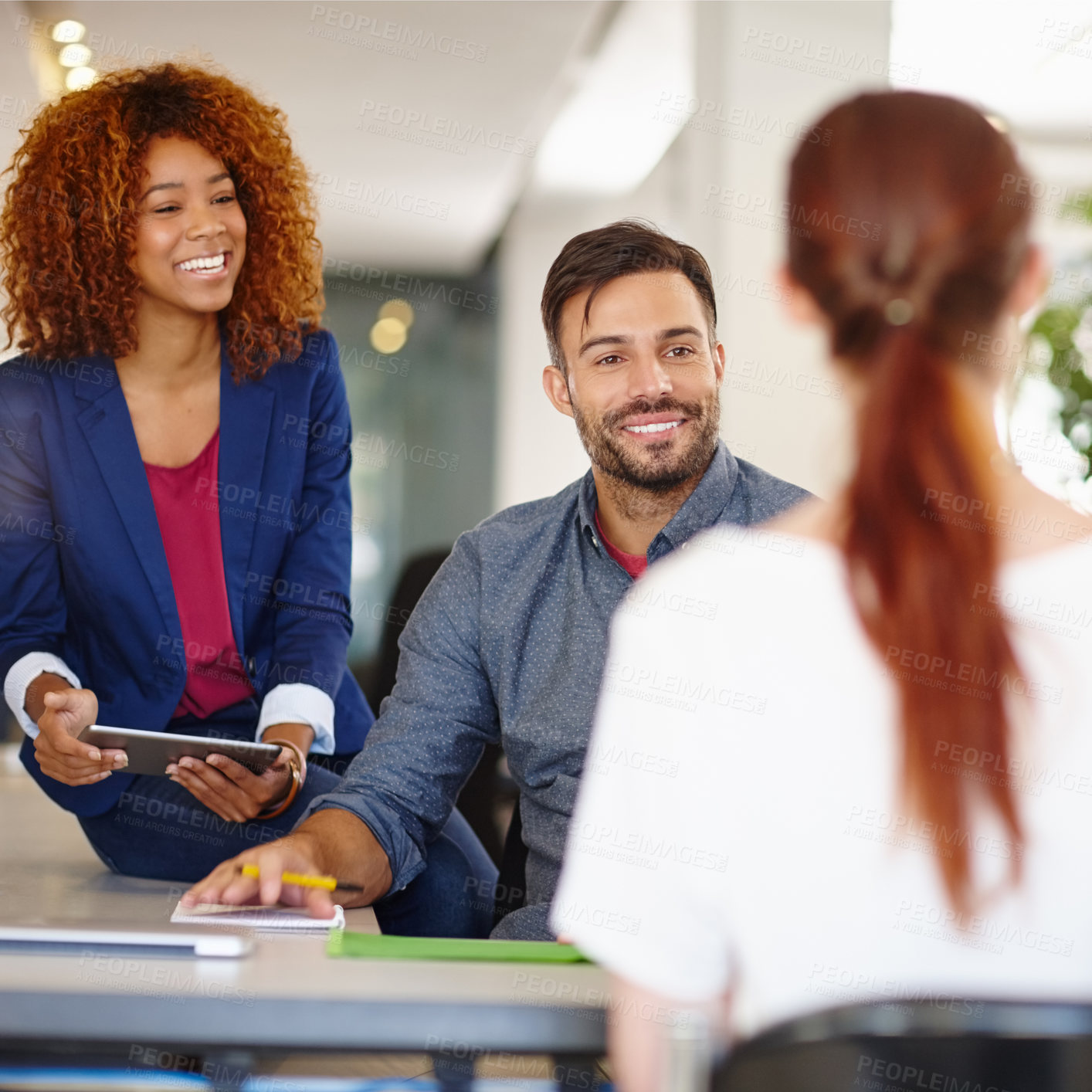 Buy stock photo Cropped shot of a group of colleagues working together in an office