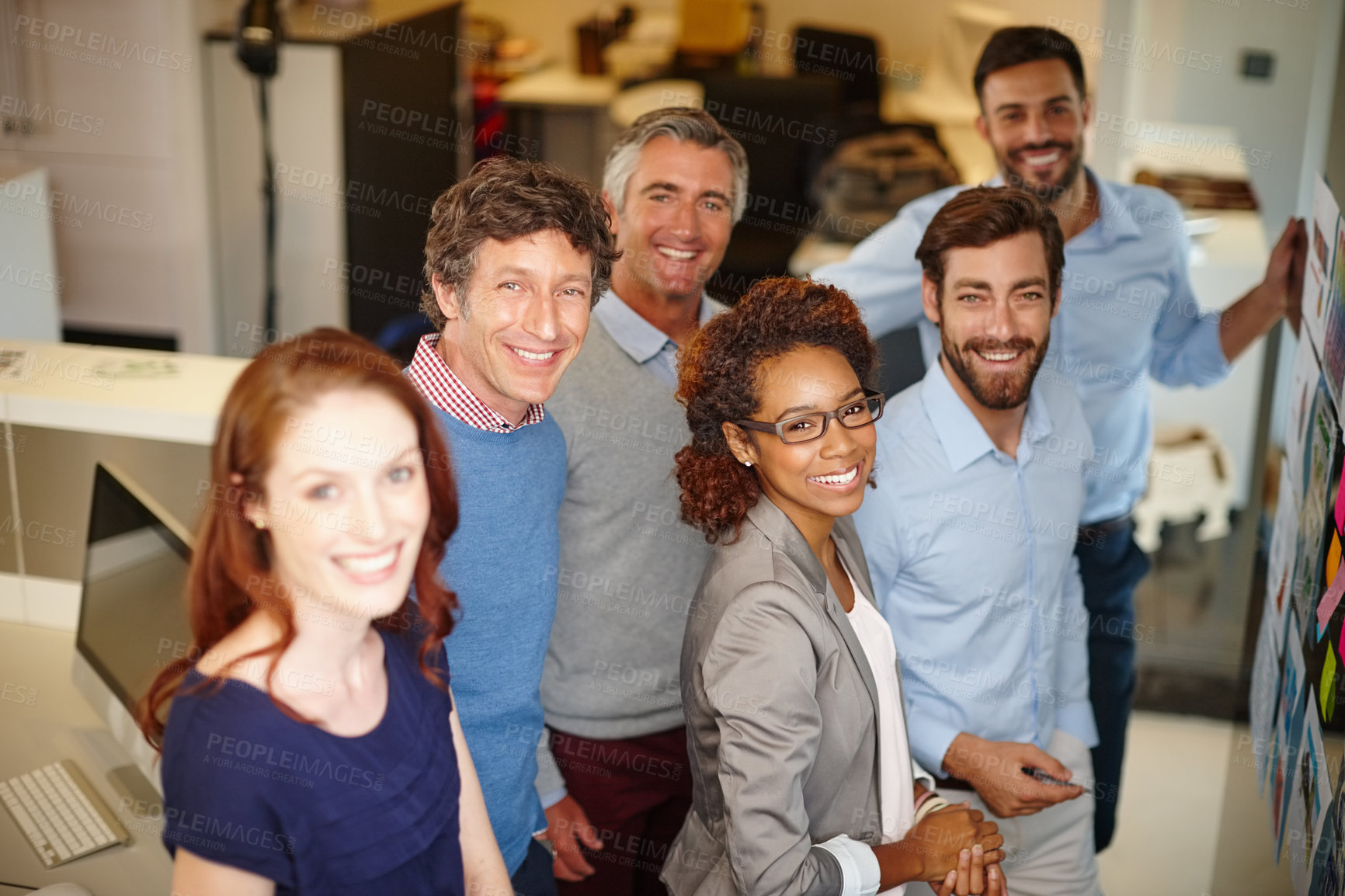 Buy stock photo Portrait of a group of colleagues having a brainstorming session at work