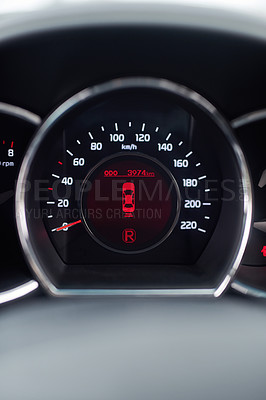 Buy stock photo Dashboard, reverse and speedometer of car for information, safety or travel with lights closeup. Automobile, transportation and system display on vehicle interior for drive, journey or road trip
