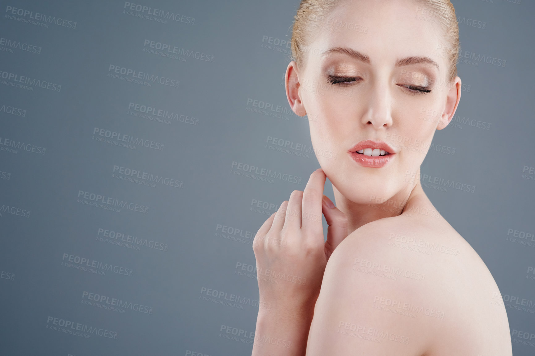 Buy stock photo Beauty, skincare and face of woman on gray background for wellness, cosmetics and facial treatment. Dermatology, mockup space and person with spa aesthetic for natural skin, salon and glow in studio