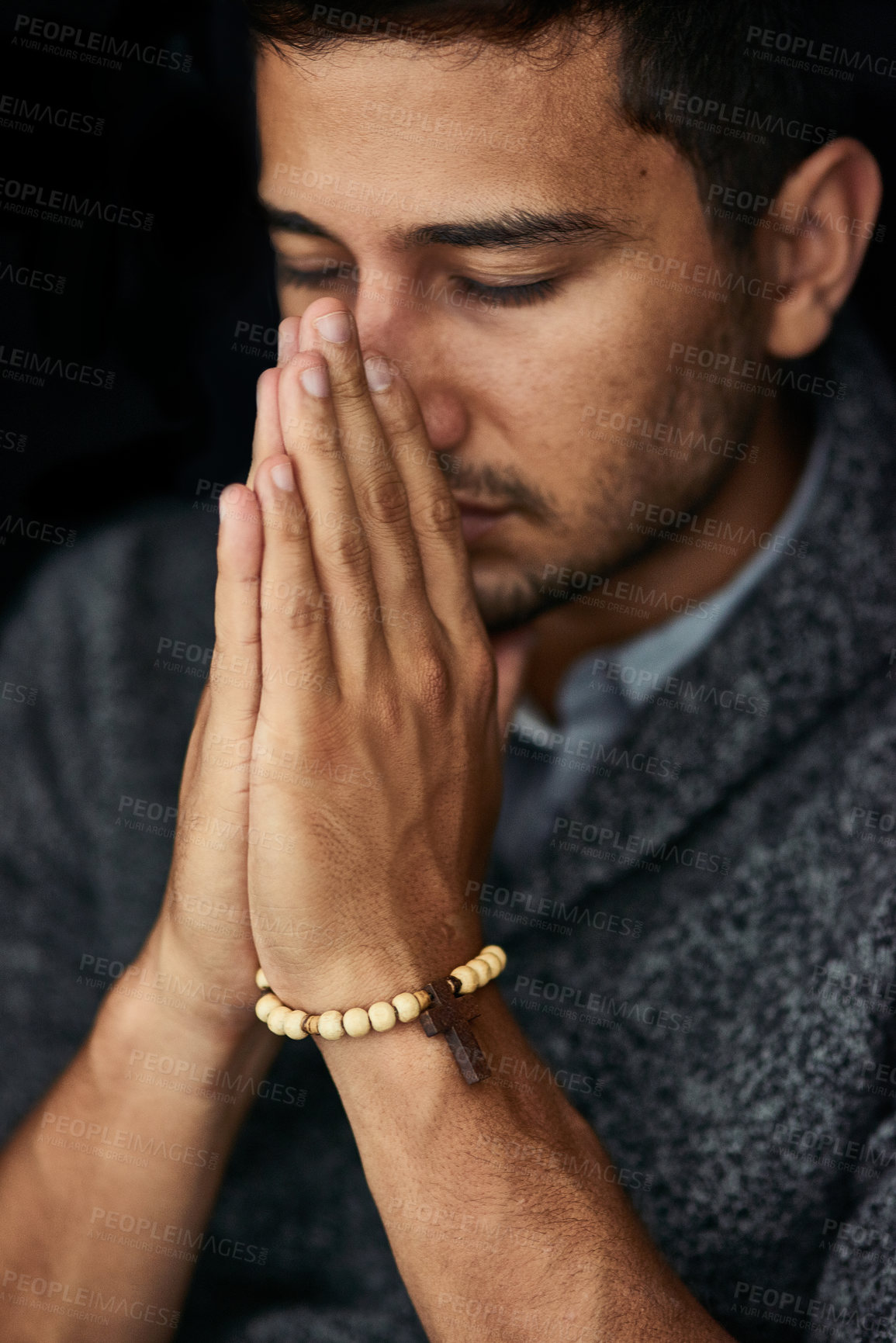 Buy stock photo Hands, calm or man in studio praying for hope, help or guidance to worship God on black background. Eyes closed, rosary or Christian person asking for safety in prayer to Jesus for spiritual support