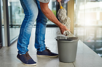 Buy stock photo Janitor, mop or cleaning floor in office for housekeeping, building maintenance and hygiene services. Bucket, hospitality professional or caretaker in workplace for health, maintenance or bacteria