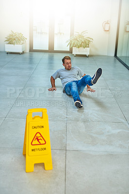 Buy stock photo Shot of a man cleaning an office building