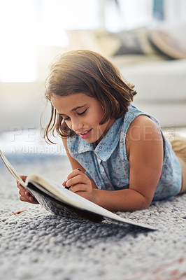 Buy stock photo Cropped shot of a young girl writing in a book at home
