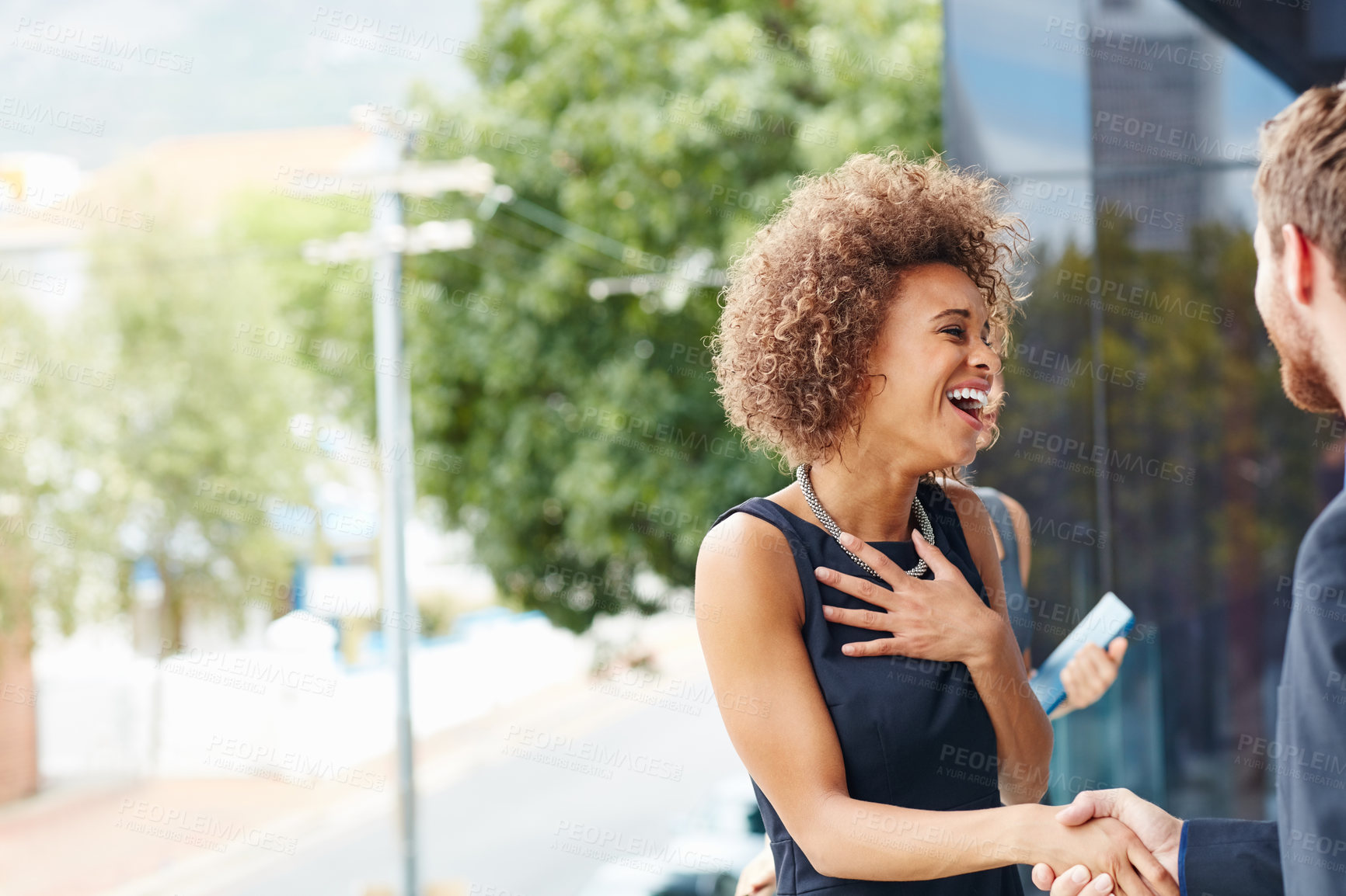 Buy stock photo Handshake, agreement and woman in city, introduction and thank you with victory. Happy employees, shaking hands or coworking with partnership, b2b deal or achievement with meeting, success or support