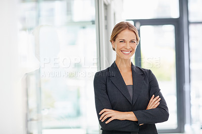 Buy stock photo Portrait of a businesswoman standing in an office