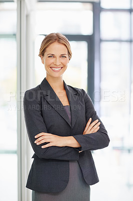 Buy stock photo Portrait of a businesswoman standing in an office