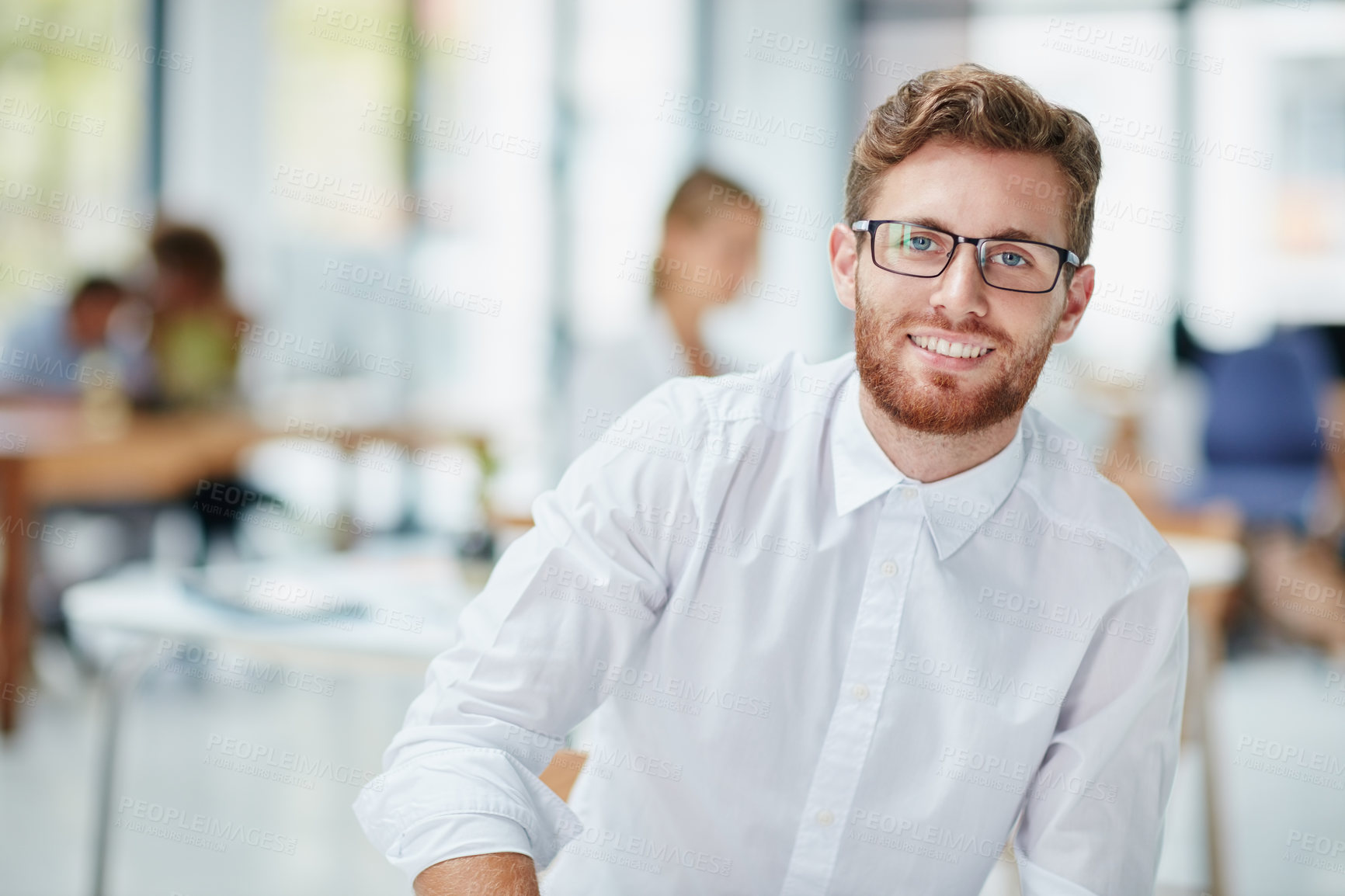 Buy stock photo Portrait of a happy businessman sitting in the office