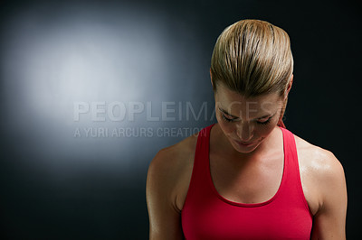 Buy stock photo Cropped shot of an attractive young woman in workout attire