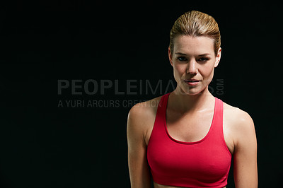 Buy stock photo Cropped portrait of an attractive young woman in workout attire