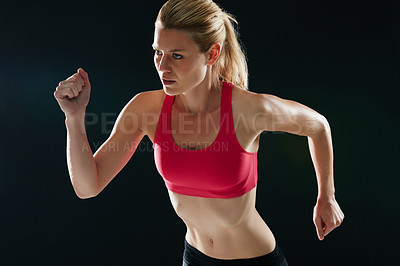 Buy stock photo Cropped shot of an attractive young female sprinter