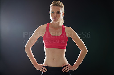 Buy stock photo Cropped portrait of an attractive young woman in workout attire