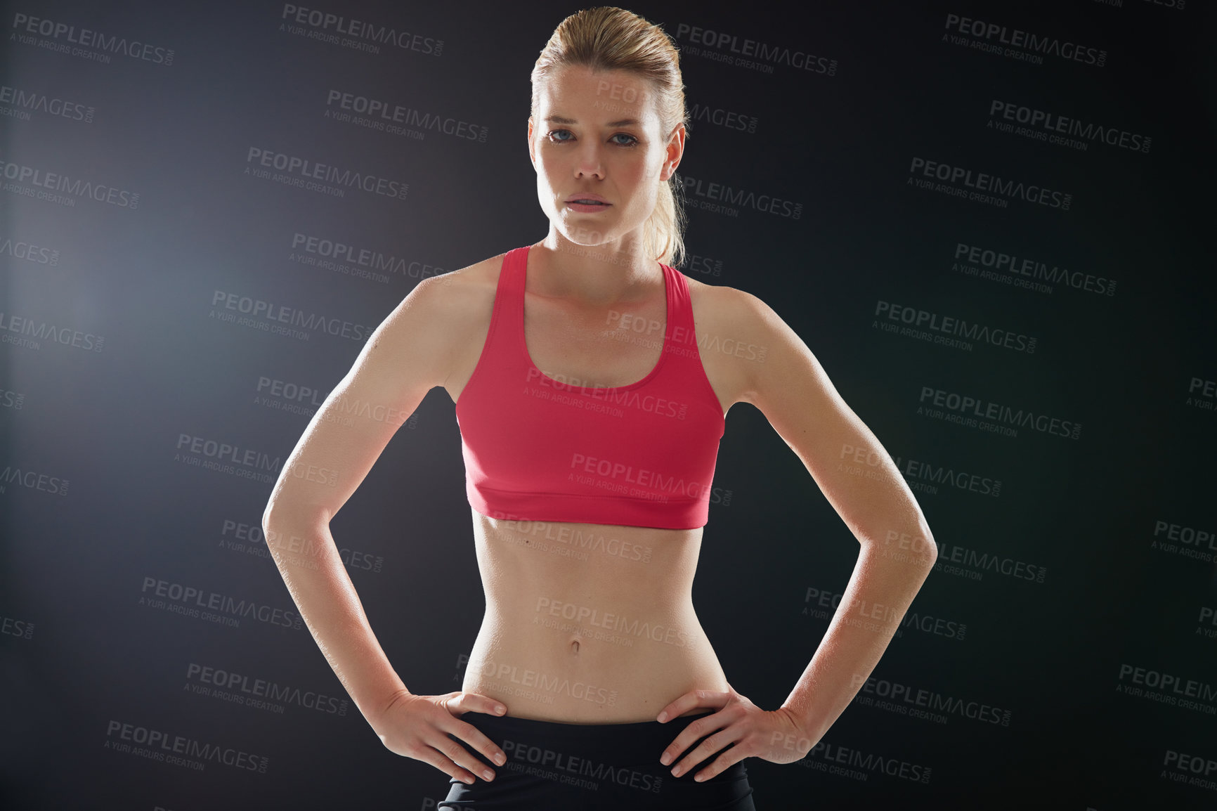 Buy stock photo Cropped portrait of an attractive young woman in workout attire