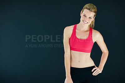 Buy stock photo Cropped portrait of an attractive young woman in workout attire