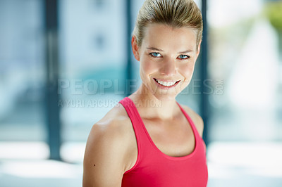 Buy stock photo Cropped portrait of an attractive young woman in workout attire