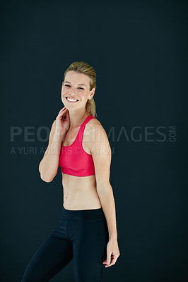 Buy stock photo Cropped portrait of an attractive young woman in workout attire