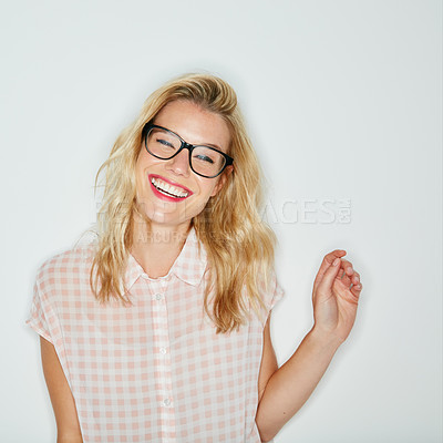 Buy stock photo Cropped shot of a beautiful young woman posing against a white background