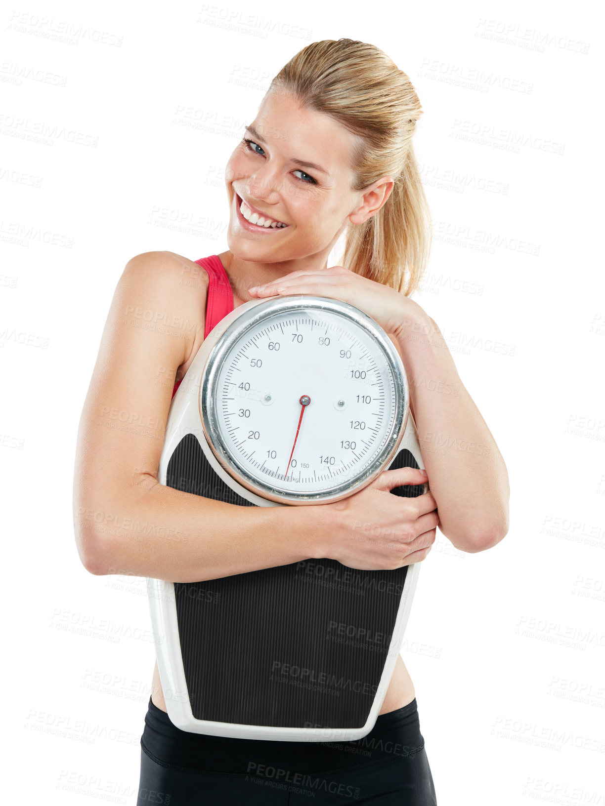 Buy stock photo Studio shot of an athletic young woman holding a scale