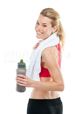 Buy stock photo Studio shot of an athletic young woman holding a water bottle