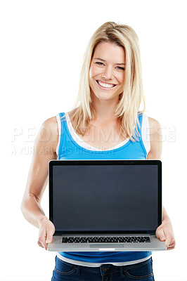 Buy stock photo Shot of a young woman holding a laptop against a white background